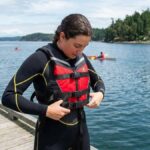 How to Wear a Life Jacket Over a Wetsuit